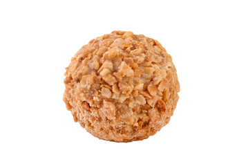 Round candies decorated with crushed nuts isolated on a transparent background.