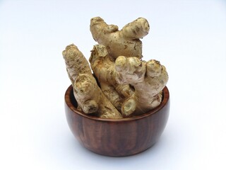 Ginger in a wooden bowl 
