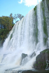 Stunning low angle view of Iguazu Falls at Argentinian side, UNESCO World Heritage in Puerto...