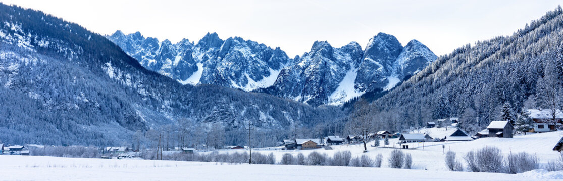 beautiful panoramic snowy winter landscape with Dachstein mountins in Gosau