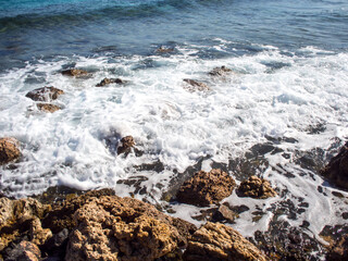 Sea view , rocks and splash of waves