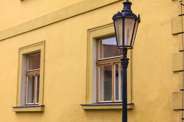 Street lamp, element of European touristic cozy city. Background with selective focus and copy space