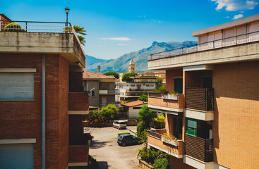 Apartment buildings and church in Scauri, Italy.