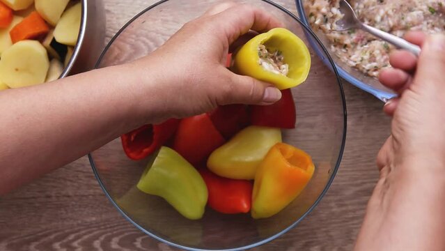 prepare sweet peppers for stuffing remove seeds and partitions