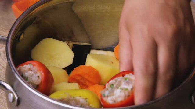 colorful stuffed peppers in red sauce
