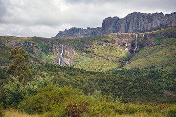 Fototapeta na wymiar Waterfalls under Andringitra massif as seen during trek to pic Boby peak