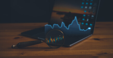 man use magnifying glass and computer laptop on wooden table searching for best option to investment in stock market or mutual funds, sale deal, Data Search, information, stock market, trading graph, 