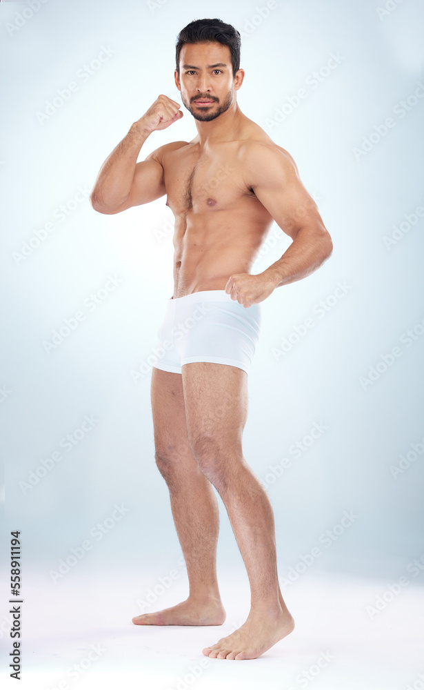 Poster Fitness, underwear body and man with fist, studio or martial arts for muscle, wellness or strong by backdrop. Model, mma and shirtless for balance, posture or portrait by studio background with focus