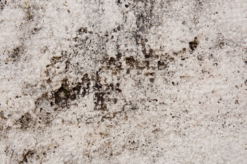The texture of the stone is beige with irregularities. Abstract background	