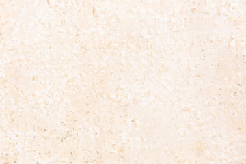 Embossed beige stone texture. Natural material as background.
