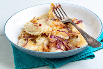 Homemade vareniki (dumpling) with cabbage.