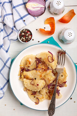 Traditional dumplings (piegori) with cabbage.