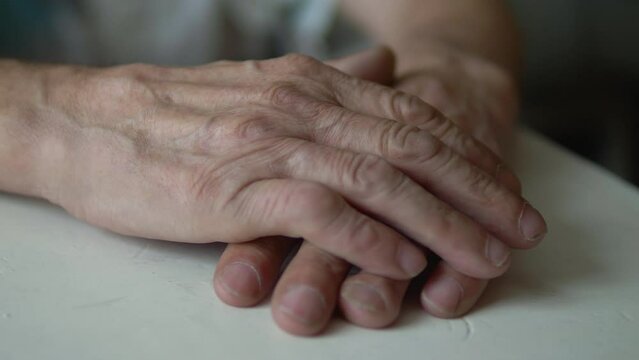 hands of an elderly person, elderly people concept, caring for loved ones, the health of the old man, the pesioner expects, loneliness in old age, caring for parents, depression in old age