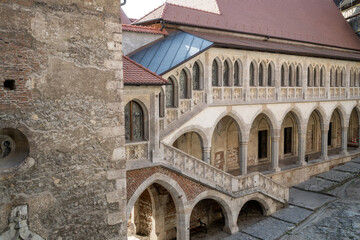 Fototapeta na wymiar HUNEDOARA, ROMANIA - AUGUST 20, 2022: View with the inner courtyard of the Hunedoara Castle, also known as Corvin Castle in Hunedoara, Romania