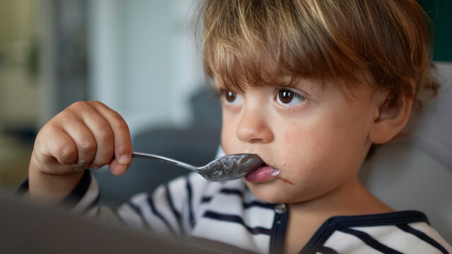 Toddler 2 year old baby eating yogurt2