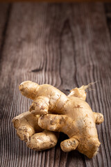 Organic fresh ginger root on the table.