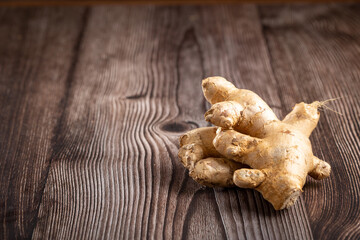 Organic fresh ginger root on the table.
