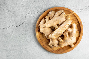 Organic fresh ginger root on the table.