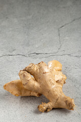 Organic fresh ginger root on the table.