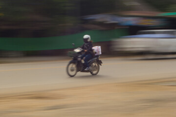 Motorcycling Panning on road In Thailand