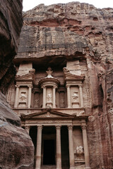 Fototapeta na wymiar The Treasury tomb carved in stone, at the famous archaeological site Petra in Jordan.