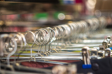 women's clothing on hangers in the store