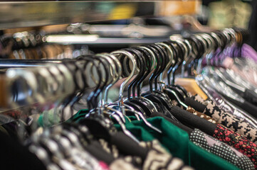 women's clothing on hangers in the store