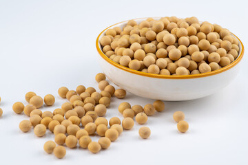 Pile of soybean on white surface