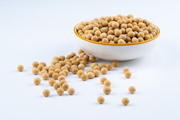 Pile of soybean on white surface