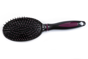 brosse à cheveux sur un fond blanc 