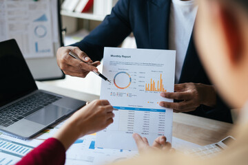 Meeting concept Business team hands at working with financial plan, meeting, discussion, brainstorm with tablet on the office desk,