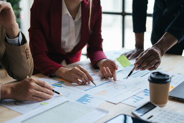 Meeting concept Business team hands at working with financial plan, meeting, discussion, brainstorm with tablet on the office desk,