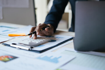 Meeting concept Business team hands at working with financial plan, meeting, discussion, brainstorm with tablet on the office desk,