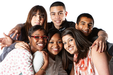 Teenage Students: Close Friends. A relaxed group of 6 diverse late-teen college friends with bright smiles and eye contact isolated on white.