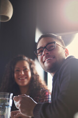 Young couple drink coffee in the cafe and enjoying