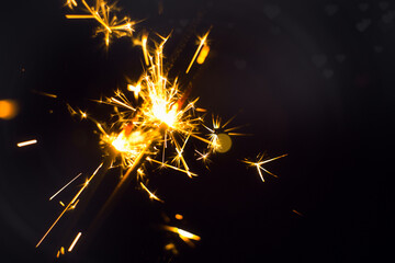 Wunderkerze - Neujahr / Silvester / Feier - Glittering - Burning Sparkler, Happy New Year ,- Blurred Bokeh Light	
