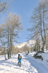Fototapeta na wymiar A child during a touring ski excursion