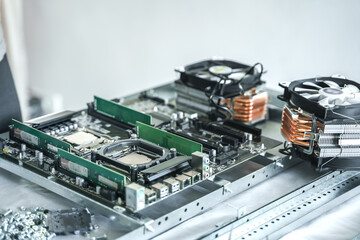 Man engineer,collector.Independent self computer assembly. Mounting in sockets processor,random access memory RAM,motherboard,fan. Assembly of home crypto farm.Generating tokens,cryptocurrency mining