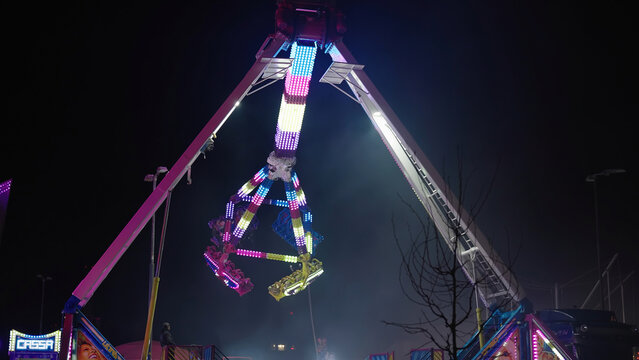 Amusement Park Giant Pendulum Ride Excitement At Night