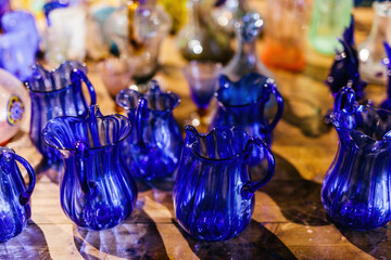 Murano glass exhibition of handmade glassware at workshop in Murano, Italy