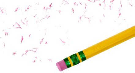 Top end of a classic yellow and green no 2 pencil with scattered eraser dust