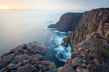 Cape Raoul Cliffs at sunset with Beautiful coast landscape of Tasman National Park in Tasman peninsula, Tasmania, Australia. - obrazy, fototapety, plakaty