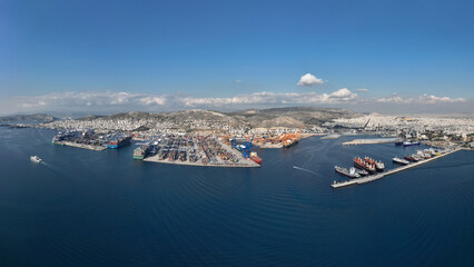 Aerial drone panoramic photo of industrial container logistics unloading import and export...