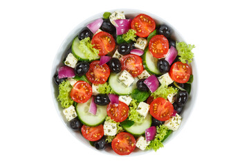Greek salad with fresh tomatoes olives and feta cheese healthy eating food from above isolated on white