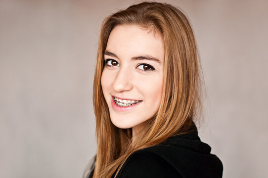 gorgeous teenage girl wearing braces