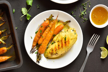 Roasted chicken breast with carrots
