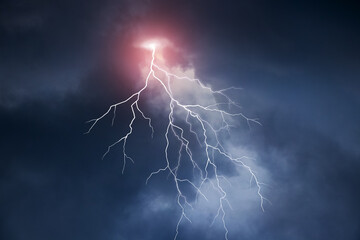 Dark stormy sky with bright lightning. Stormy weather