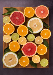 Citrus background with limes, lemons, grapefruits and oranges