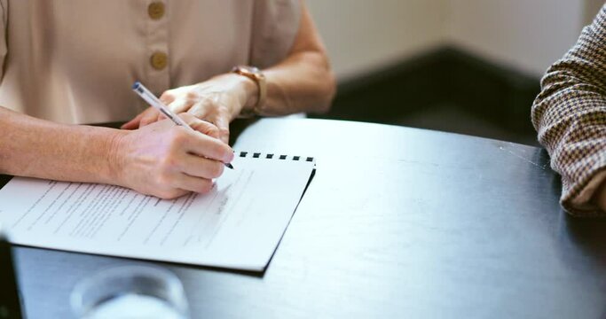 Contract, hands and signature with partnership or hiring, employee with human resources documents and folder. Business people, writing and pen with hr paperwork on desk, partner with business deal.