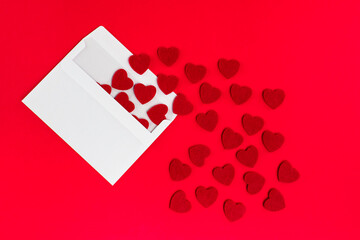 valentines hearts falling out of the envelope 